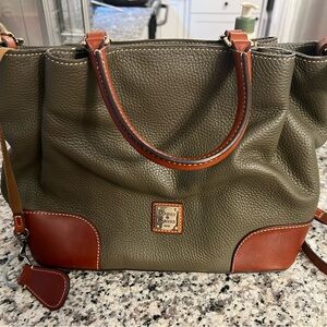 Never carried Dooney and Burke in pebbled leather with zipper clutch and key fon